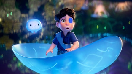 Young boy standing inside glowing blue orb in animated film still