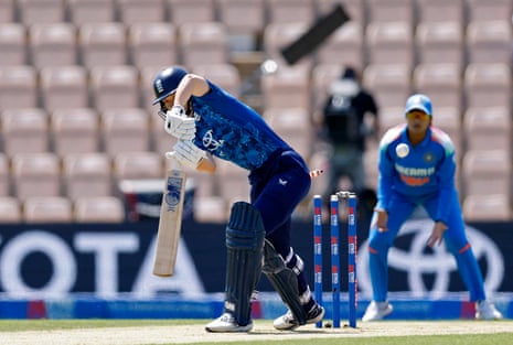 Amy Jones is bowled by Kranti Goud.