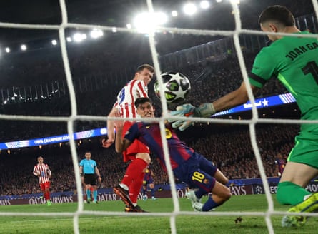 Alexander Sørloth scores Atlético Madrid’s second goal past Joan Garcia.