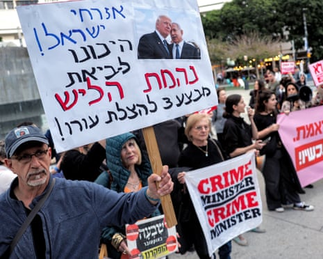 Protesters attend an anti-war demonstration organised by left-wing activists in Tel Aviv