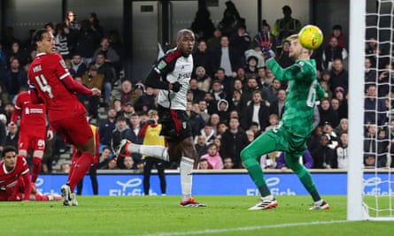 Issa Diop of Fulham deflects the ball into the Liverpool goal to make it 1-1.