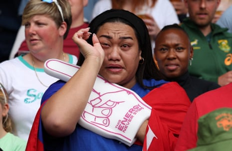 A fan reacts after cheering on their team ahead of the Women's Rugby World Cup pool A match between Australia and Samoa.