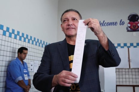 Kassio Nunes Marques, president of Brazil's electoral court in a polling station before voting began on Sunday.