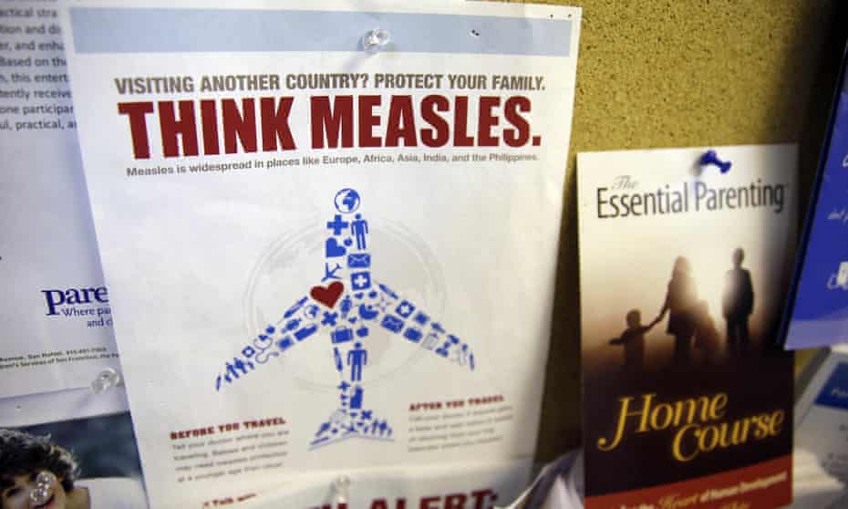A poster warning of the dangers of travelling without a measles vaccination
