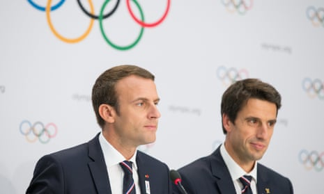 President Emmanuel Macron, left, and the Paris 2024 Olympic bid co-president Tony Estanguet hold a press conference after the presentation of the Paris 2024 Candidate City Briefing in Lausanne, Switzerland.