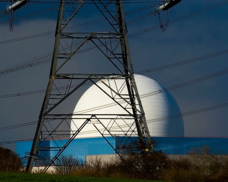 White dome of building behind electricity pylon