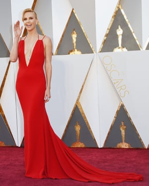 Charlize Theron. A navel-skimming V. Is that for risqué reasons or is she doing all she can to fulfil a diamond contract by drawing attention to that million-dollar medallion there?