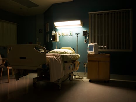 Bed in darkened empty hospital room USA, California, Hawthorne.