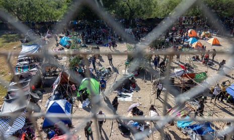 Thousands of migrants, mostly from Haiti, gather at a makeshift encampment under the International Bridge between Del Rio, Texas and Acuña, Mexico.