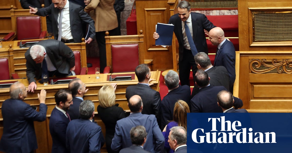 Greek PM survives confidence vote but phone-tapping scandal rumbles on