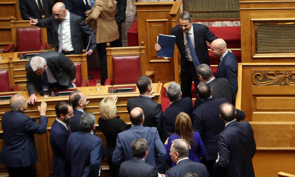 Greek PM survives confidence vote but phone-tapping scandal rumbles on