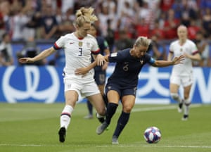 France’s Amandine Henry, right, and United States’ Samantha Mewis battle for the ball.