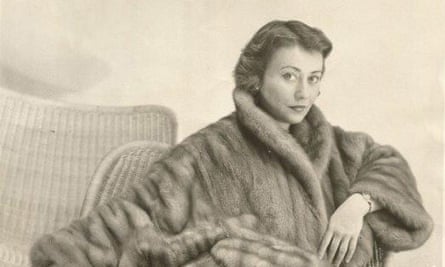 Marilyn Stafford in borrowed mink coat during a 1950s fashion shoot in Paris.