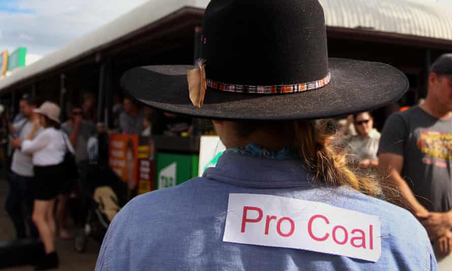 A woman with a 'pro coal' sign in Queensland