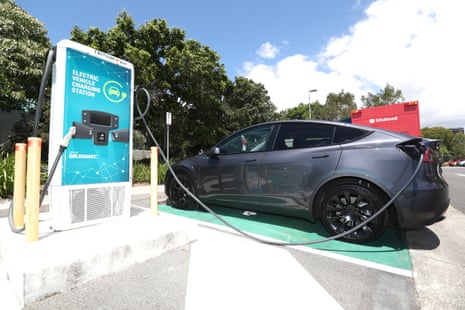 Electric car charging at a charging station