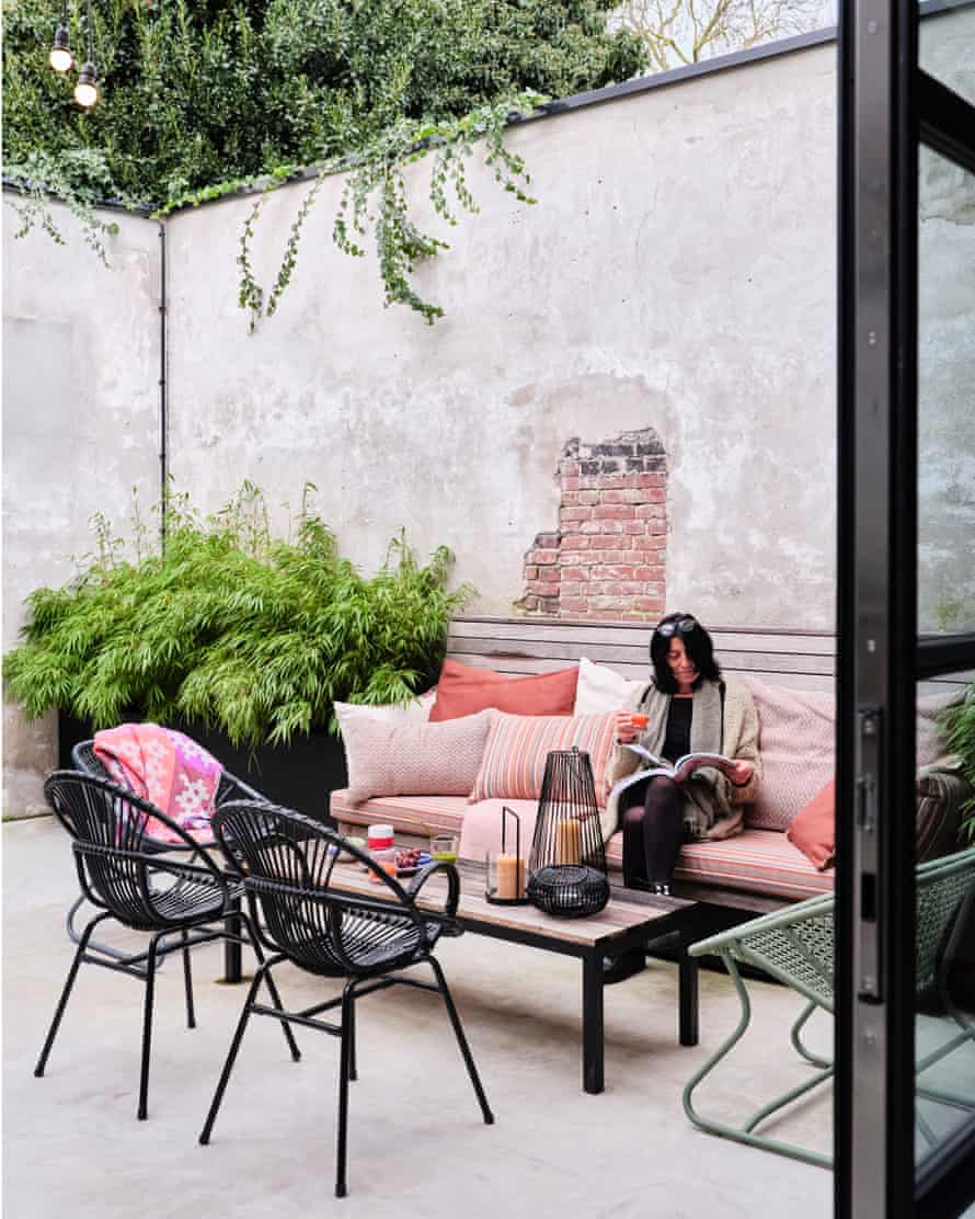 Enclosed garden: Yasmina van den Oetelaar relaxes in her inner courtyard.