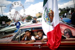 Mexico City, Mexico: Lowrider car enthusiasts parade during the country’s Independence Day festivities