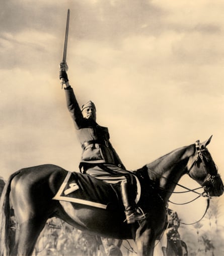 Benito Mussolini on horseback holding the sword of Islam, Tripoli, 1937