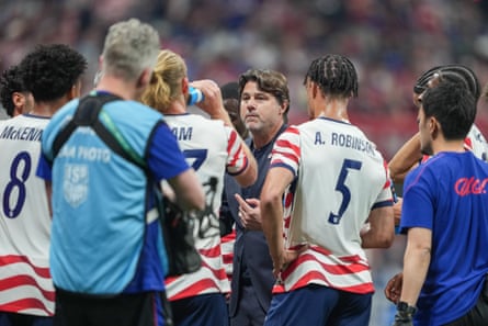 United States caput coach Mauricio Pochettino talks pinch nan squad during nan first half against Belgium during an world friends astatine Mercedes-Benz Stadium connected March 28, 2026 successful Atlanta, Georgia.