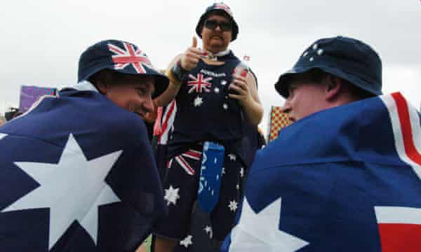 Three men wearing Australian flags at the Big Day Out, 2007.