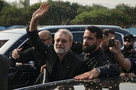 Larijani waving to supporters