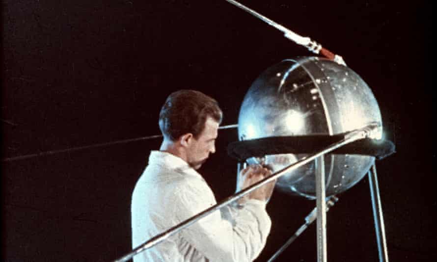 a soviet technician works on sputnik one in 1957