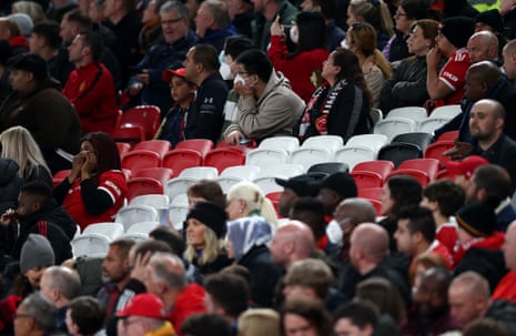 Empty seats amongst the Manchester United fans, seen after the 73rd minute of the match.