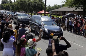 The funeral procession makes its way down Muhammad Ali Boulevard