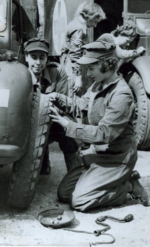 1945: Princess Elizabeth changes a wheel on a truck as she trains as an ATS (auxiliary territorial service) officer, driving and maintaining vehicles as part of the war effort