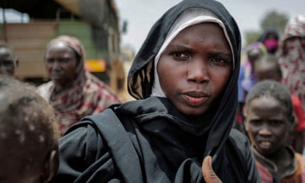 A tearful Amani Abdullah, 20, a Sudanese woman, who fled the conflict in Geneina, mourns her husband who, according to her, was killed by the RSF at their house.