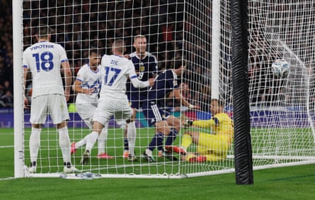 Ryan Christie gives Scotland the lead from close range.