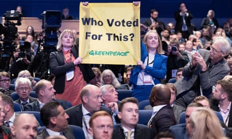 Conservative delegates booed Greenpeace protesters