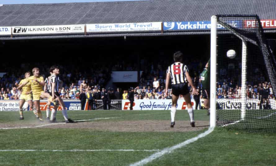 Kerry Dixon of Chelsea scores the winning goal at Grimsby to secure the Canon League Division Two title in 1984.