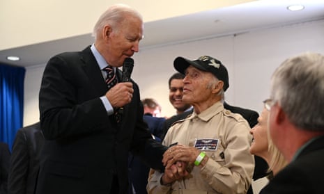 Joe Biden speaks with Ray Firmani, a 101-year-old second world war pilot, in New Castle, Delaware, on Friday.