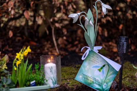 A candle alongside tributes placed in the Garden of Remembrance in Dunblane Cemetery.