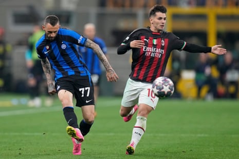 Brahim Diaz is challenged by Marcelo Brozovic.