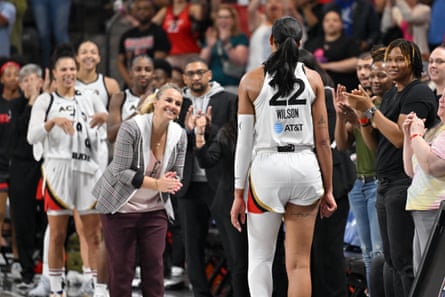 A'ja Wilson celebrated with Aces coach Becky Hammon after her record-tying night.