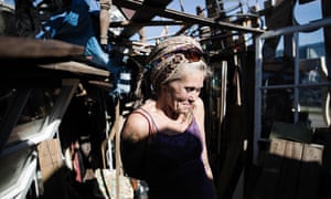 Mavin Carter-Griffin talks in her home in an encampment in West Oakland, California.