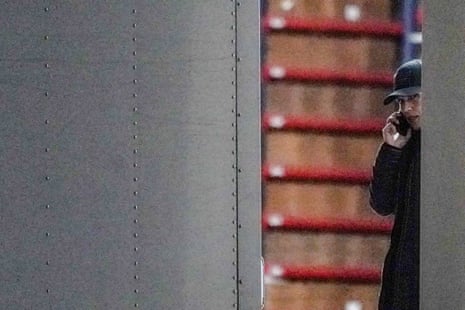 Tulsi Gabbard, the US director of national intelligence, was photographed speaking to someone on the phone as the FBI executed a search warrant at an elections center in Fulton county, Georgia last month.