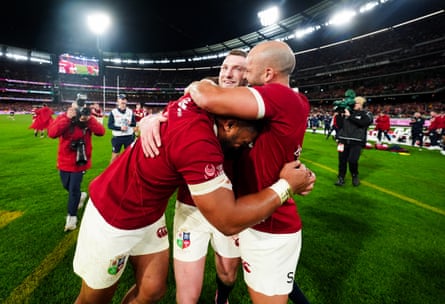 Bundee Aki, Finn Russell and Jamison Gibson-Park celebrate after the second Test