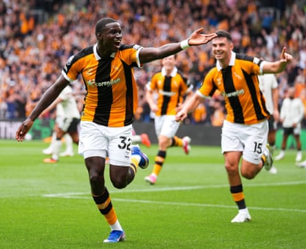 Nobel Mendy celebrates after scoring for Hull against Manchester United.