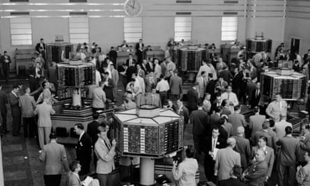 The floor of the Toronto Stock Exchange on a busy morning in 1955.