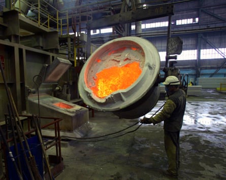 A worker supervises the production of aluminium at Rusal’s smelter in Krasnoyarsk