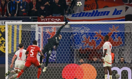 Caoimhín Kelleher tips a deflected shot over the bar.