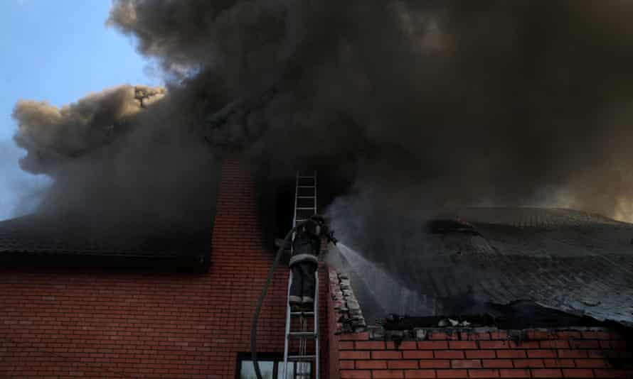 Russia-Ukraine war latest: fierce fighting in Sievierodonetsk; UK ‘deeply concerned’ by death sentences for Britons in Donetsk – live | World news 11 A firefighter works following a military strike on the outskirts of Kharkiv, Ukraine.