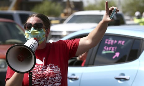 Teachers hold a ‘#Return2SchoolSafely’ protest in Phoenix, Arizona, on 15 July. 