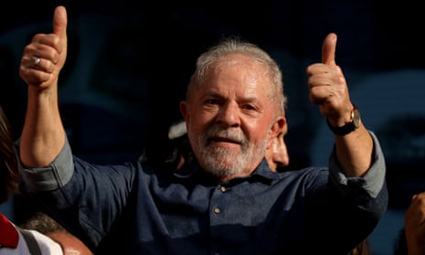 Former president of Brazil Luiz Inacio Lula da Silva gestures during a labour day demonstration.