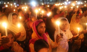 Women take part in a candlelight vigil to mark International Women’s Day in Dhaka, Bangladesh.