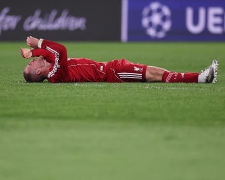 TOPSHOT-FBL-EUR-C1-PSG-LIVERPOOLTOPSHOT - Liverpool's Argentinian midfielder #10 Alexis Mac Allister reacts on the ground during the UEFA Champions League quarter-final first leg football match between Paris Saint-Germain (PSG) and Liverpool FC at the Parc des Princes stadium in Paris on April 8, 2026. (Photo by FRANCK FIFE / AFP via Getty Images)
