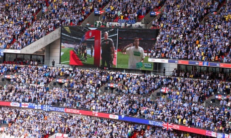 The national anthem is shown on the Wembley’s big screen ahead of the Barnsley v Sheffield Wednesday, Sky Bet League One playoff final.